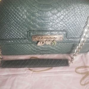 Green alligator clutch